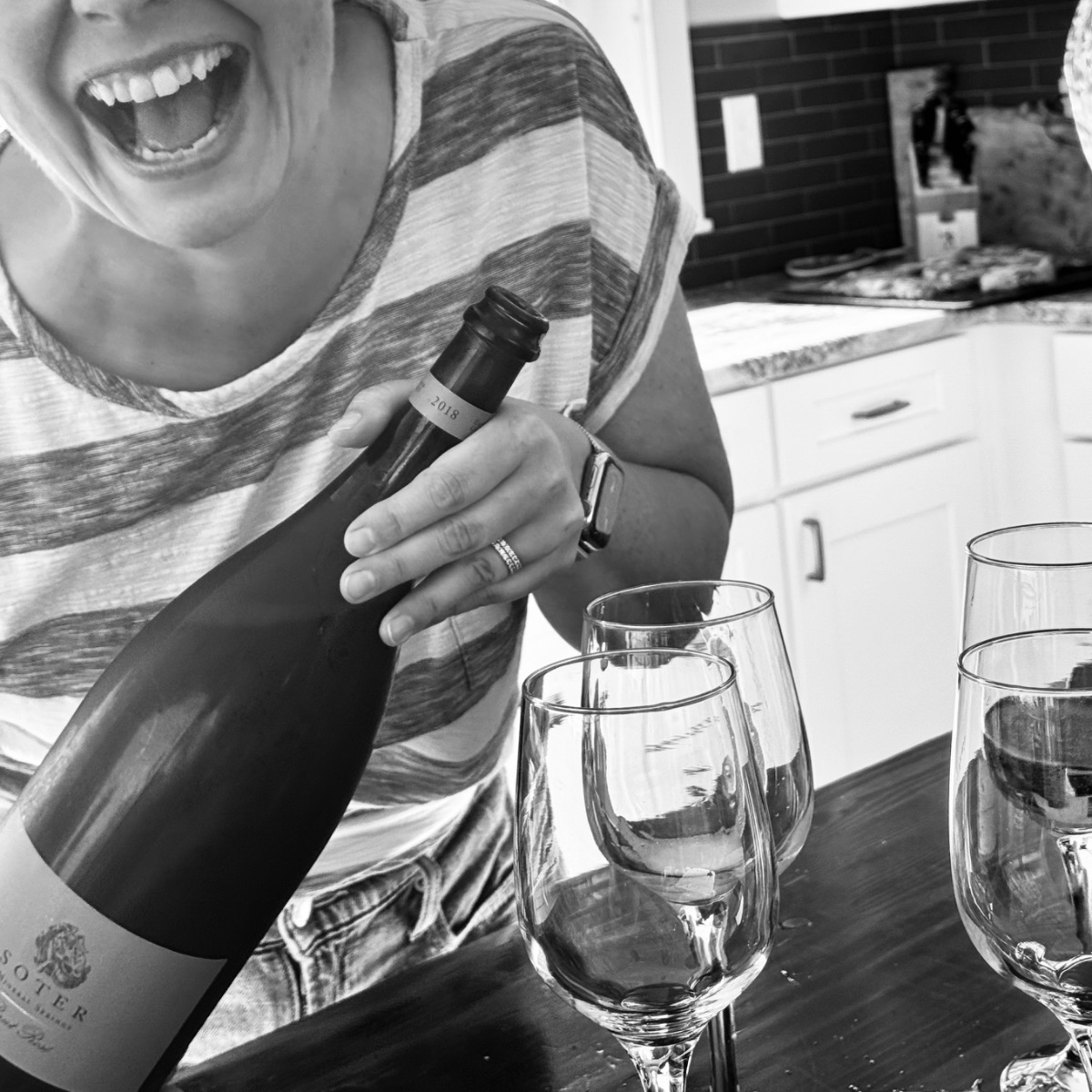 Opening a bottle of Oregon sparkling wine